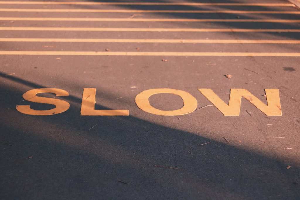slow road sign